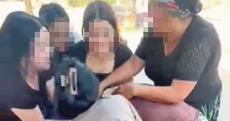 Kucağında bebeği varken dövüp kameraya çektiler