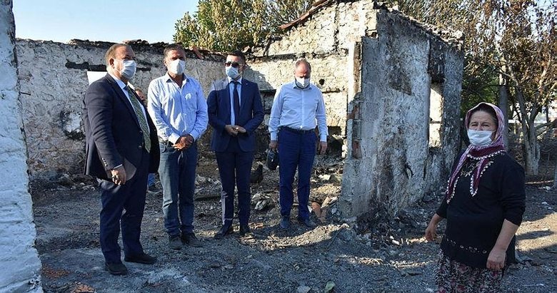 Muğla Valiliği evleri yandığı için traktör römorkunda yaşayan aileye sahip çıktı