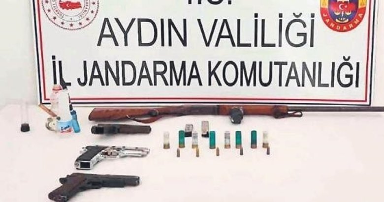 Uyuşturucu baskınında PKK simgeleri ve silah bulundu