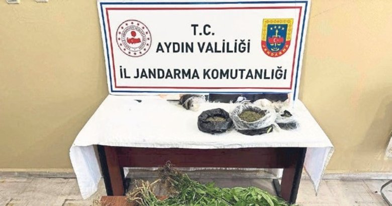Efeler’de evden uyuşturucu ve silah cephaneliği çıktı