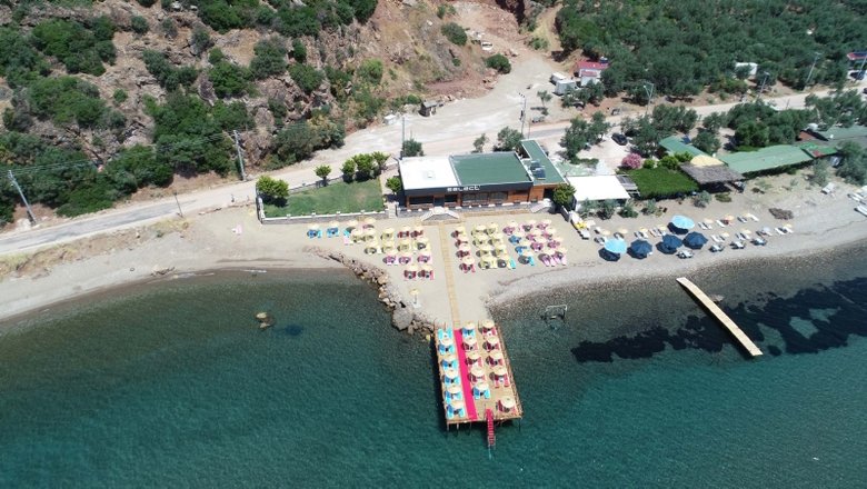 CHP’li vekiller açılışını yapmıştı! Assos bölgesinde kaçak plaj tesisi için yıkım kararı