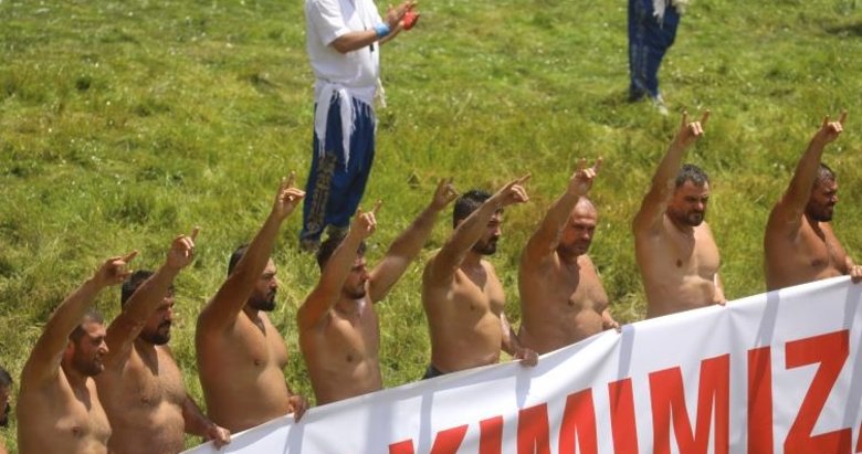 Başpehlivanlardan er meydanında Bozkurt işareti