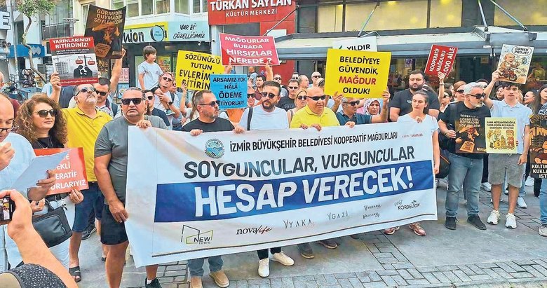 Kooperatif mağdurlarından siyah çelenkli isyan