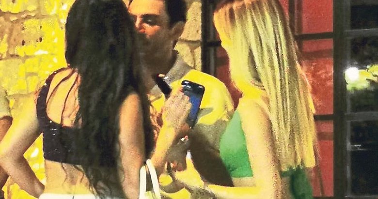 Hiç tanımadığı kadını öptü!