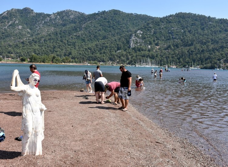 Muğla’nın Marmaris ilçesindeki Kızkumu Plajı’na turist yağıyor! Kızkumu efsanesi nedir? İşte detaylar...