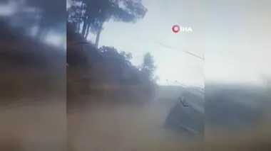 Yangının ortasında uçurumdan yuvarlandı