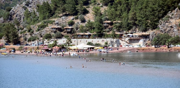 Muğla’nın Marmaris ilçesindeki Kızkumu Plajı’na turist yağıyor! Kızkumu efsanesi nedir? İşte detaylar...