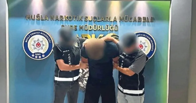 Kırmızı bültenle aranan zehir taciri yakayı ele verdi