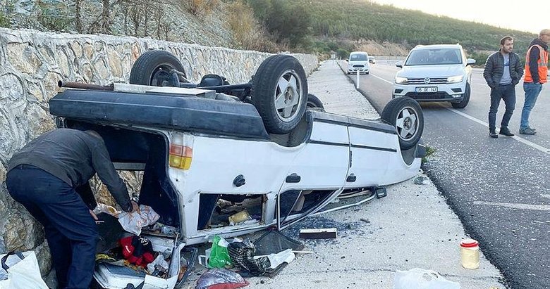 Emniyet kemeri hayat kurtardı: Hurdaya dönen araçtan burunları bile kanamadı