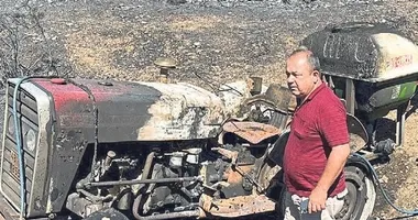 Yeni aldığı traktörüyle alevlerin arasında kaldı