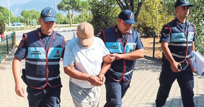 Turistleri gizlice çeken şüpheli şahsa gözaltı