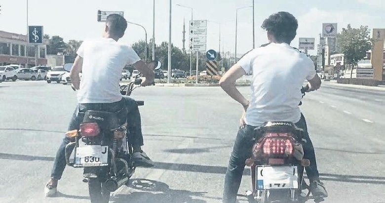 Maskeyi yüzlerine değil plakaya taktılar