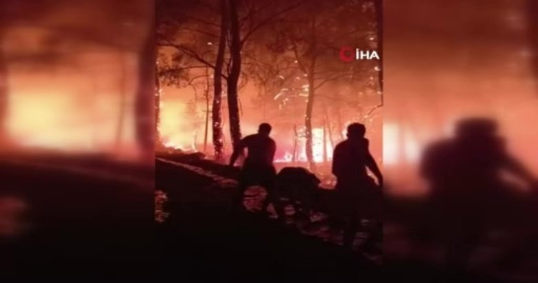 Yangın bölgesinde ölüm kalım savaşı! Çaresiz kalınca elleriyle toprak attılar