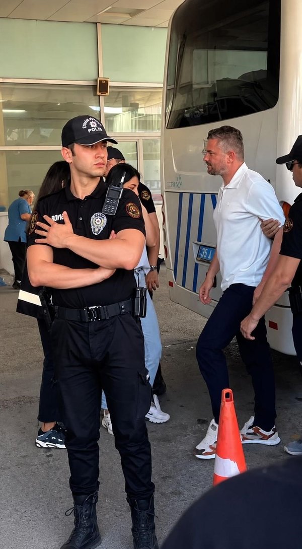 yolsuzluk-operasyonunda-gozaltina-alinmisti-buca-belediye-baskani-gorkem-dumanin-gozaltindaki-ilk-goruntusu-or-1780402459119.jpg