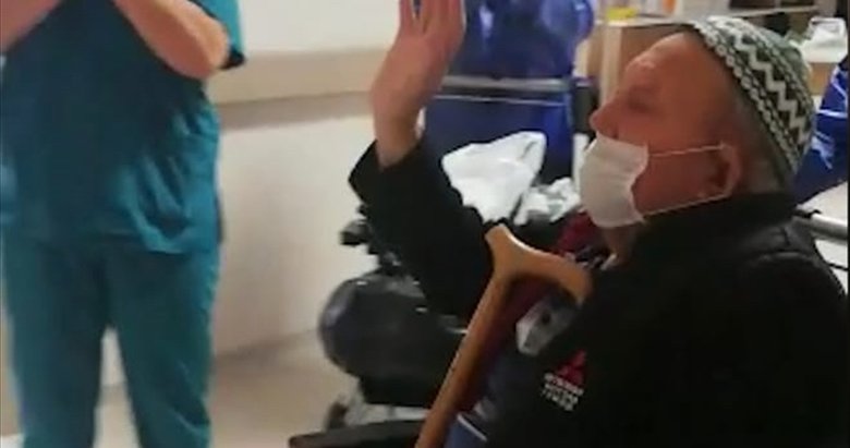 Koronavirüsü yenen 84 yaşındaki İzmirli hasta alkışlarla hastaneden taburcu edildi