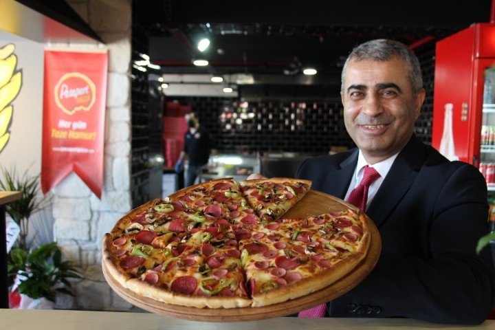 Pasaport Pizza lider ve sembol marka seçildi